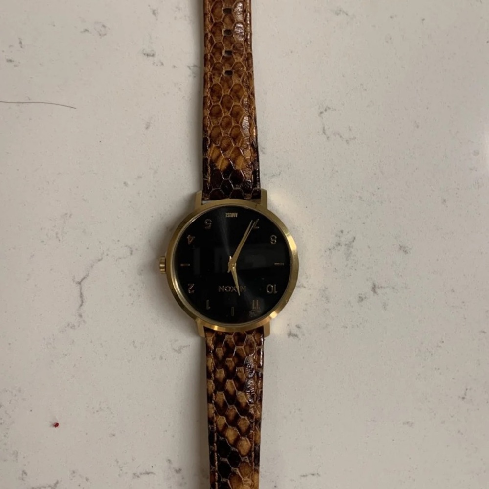 Nixon snake leather women’s watch.